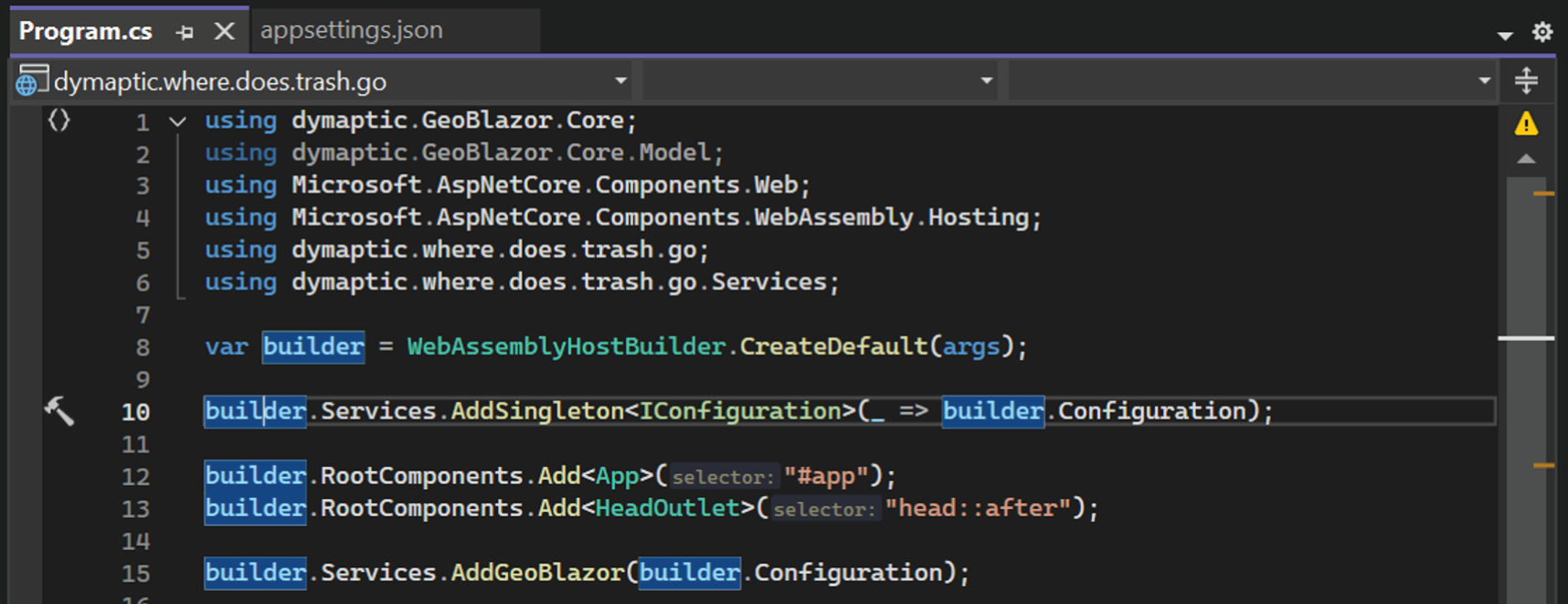 Visual Studio showing Program.cs file with AddGeoBlazor service configuration