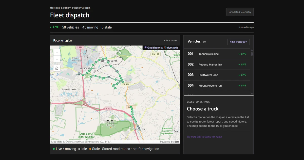 GeoBlazor fleet dispatch dashboard for the Pocono region of Monroe County, Pennsylvania: a map of green truck markers along four road routes near Mount Pocono and Tannersville, a Live status bar reading 50 vehicles, 45 moving, 0 stale, and a vehicle roster listing trucks 001 through 004 beside the map.